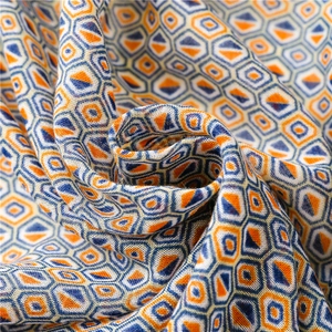Detailed close-up of retro geometric pop pattern on breathable Balinese yarn scarf fabric
