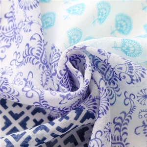Blue geometric and paisley floral cotton linen scarf with elegant tassel fringe details