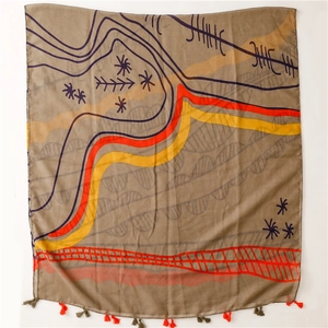 Detailed view of dark hand-painted map pattern scarf with decorative tassels