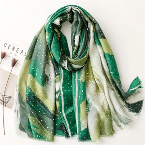 Green linen-feel scarf with gold foil ink painting texture and elegant raw edges