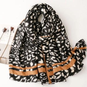 Retro leopard print pashmina scarf with fringe edges and thick cashmere-like texture