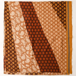 Detail of pashmina scarf with bohemian paisley patterns and dotted geometric designs