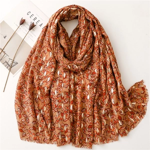 Caramel cotton linen scarf with red leaves and gold foil pattern and fringed edges
