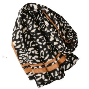 Thick leopard print cashmere scarf for women with fringe edge in brown and black