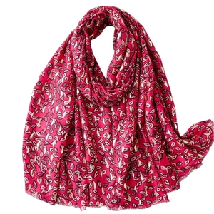 Deep pink pashmina shawl with gold leaf foil print and soft frayed edge fringe