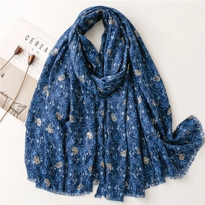 Vintage navy scarf with golden paisley pattern and fringe edge for elegant winter style