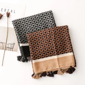 Winter scarf with geometric ring print and tassels in black-grey and brown tones