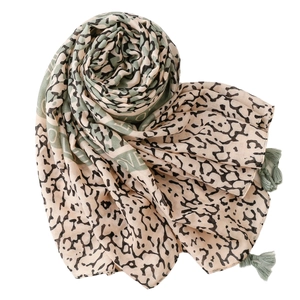 Cotton linen feel scarf with leopard print and LOVE lettering featuring fringe edges