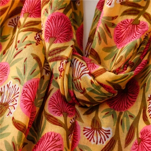 Detail of yellow cotton-linen scarf with pink floral hand-painted hydrangea pattern