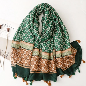 Ethnic floral print scarf with green and yellow patterns and fringe tassels