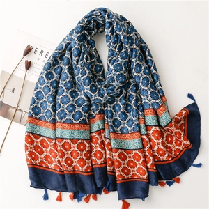 Ethnic style floral shawl with tassel trim in navy blue and orange patterns