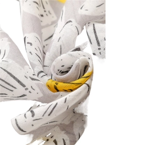 Lightweight cotton linen scarf with yellow and gray heart patterns and raw edges