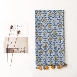 Blue floral cotton linen scarf with tassels and primrose print for summer travel