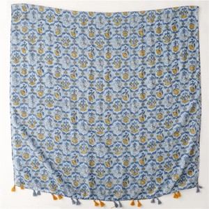 Close-up of light blue floral cotton linen scarf with yellow tassels and vintage print
