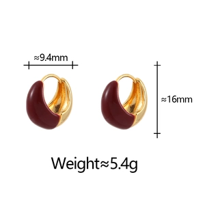 Detail view of burgundy enamel U-shaped earrings with gold plating and size dimensions