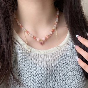 Beaded natural pink crystal heart pendant necklace for women with gold chain detail
