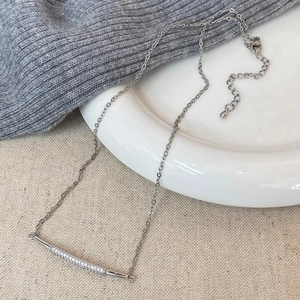 Minimalist silver micro-pasted zircon necklace with geometric bar pendant and fine chain