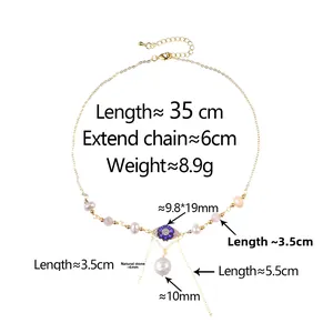 Détail du pendentif œil maléfique avec pierres naturelles roses et perles sur chaîne dorée