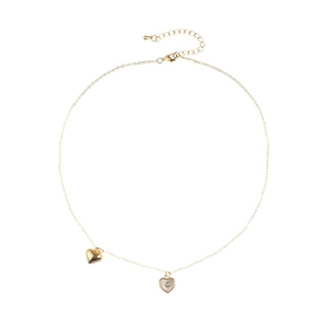 Minimalist gold necklace with dual heart pendants featuring a white shell inlay design