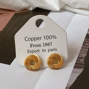 Spiral twisted knot stud earrings in 100% gold-plated copper with brushed texture