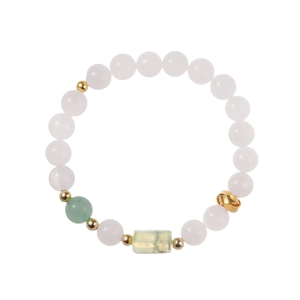 Elegant white quartz beaded bracelet with green jade charms and gold spacer beads on white background