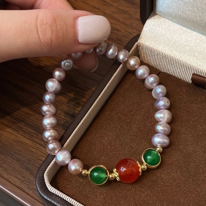 Natural freshwater pearl bracelet with red cinnabar bead and green jade accents