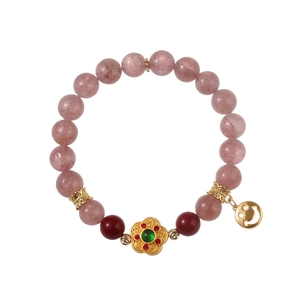 Pink natural stone beaded bracelet with flower gemstone pendant and golden smiley charm