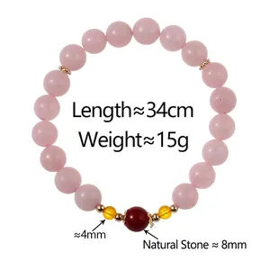 Natural pink rose quartz bead bracelet with strawberry crystal and gold metal spacers