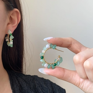 Handmade Bohemian hoop earrings with green natural stones and pearls on gold wire