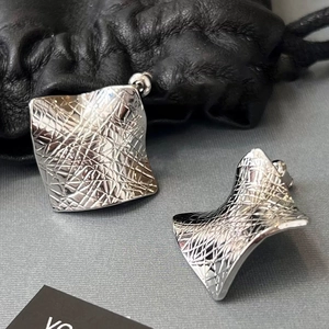 Silver square geometric earrings with crinkled metal texture and modern fashion design