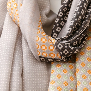 Lightweight cotton-linen scarf with clover and geometric patterns for sun protection