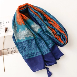 Retro ethnic boho scarf with vibrant geometric patterns and navy blue fringe trim