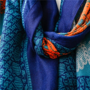 Macro shot of ethnic pattern scarf showing soft silky texture and bold geometric print