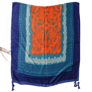 Bohemian paisley sun protection shawl with orange and blue geometric patterns and tassels