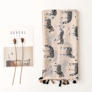 Minimalist beige zebra print scarf with tassels made of soft cotton linen fabric