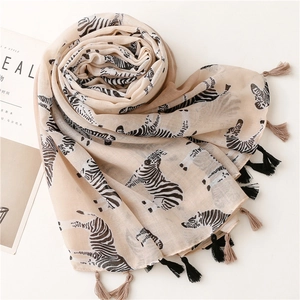 Beige cotton linen scarf with zebra print and tassel trim for women fashion