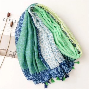 Linen feel scarf with paisley floral print, gradient colors and vibrant tassels