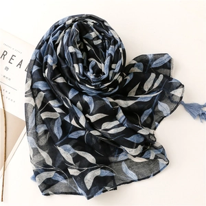 Navy blue cotton linen feel scarf with white leaf pattern and fringe tassels for women