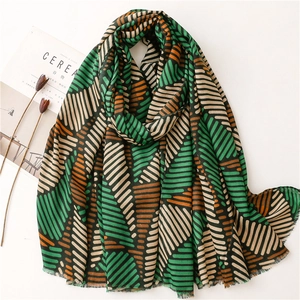 Soft cotton-linen scarf with geometric pattern and color blocking in blue and green