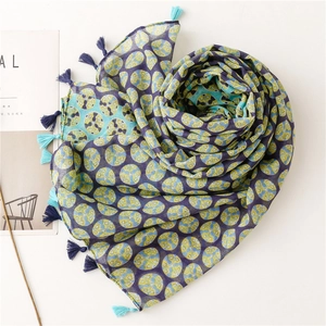 Navy blue cotton linen feel scarf with green dot pattern and tassel fringe detailing