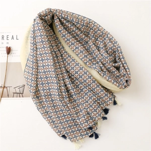 Beige cotton-linen feel scarf with geometric prints and tassels on white background