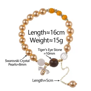 Bracelet de perles dorées avec œil de tigre et pendentif abeille en zircon pour femmes