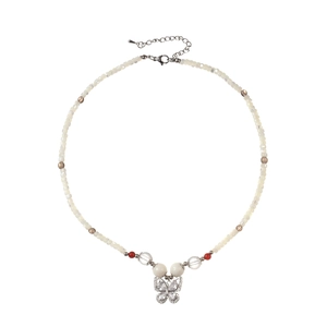 Elegant beaded butterfly necklace with white shell pearls and crystal pendant on white base