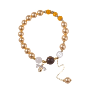Bracelet en perles dorées avec pendentif abeille en zircon et chaîne d'extension