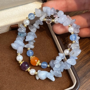 Handmade light blue natural stone bracelet set with irregular beads and white pearls