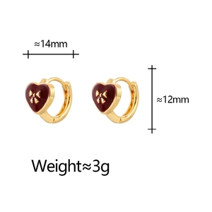 Élégantes boucles d'oreilles cœur dorées avec émail rouge et nœud doré pour femmes
