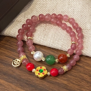 Ethnic strawberry crystal bracelet with pearls, plum blossom charm and gold accents