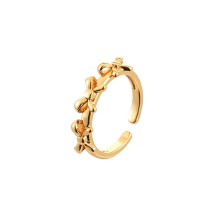 Elegant gold adjustable bow ring with three 3D butterfly motifs in a minimalist style