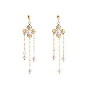 Elegant gold pearl tassel earrings with zircon four-leaf clover flower design
