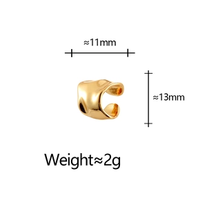Minimalist gold ear cuff with irregular texture and 13mm height dimensions
